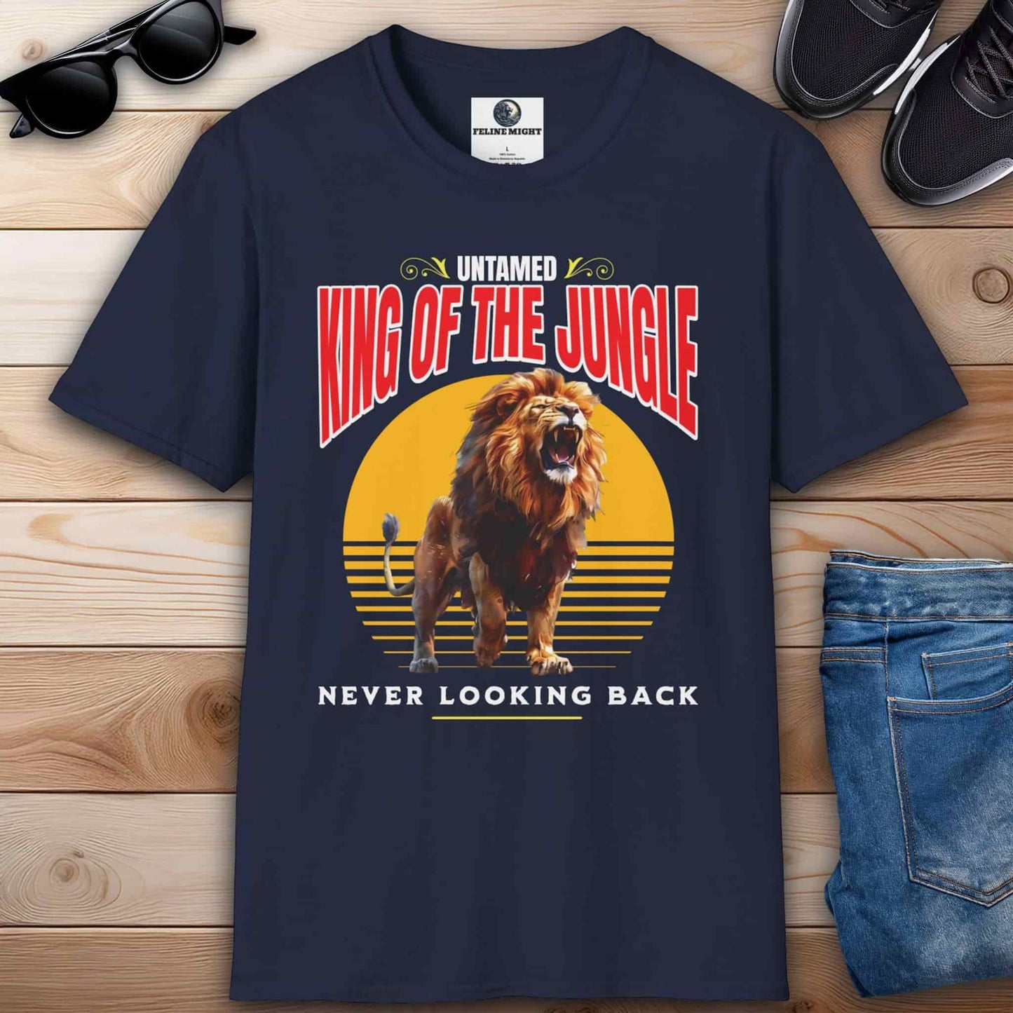 Navy blue t-shirt featuring a roaring lion with the text 'King of the Jungle' and 'Never Looking Back'.