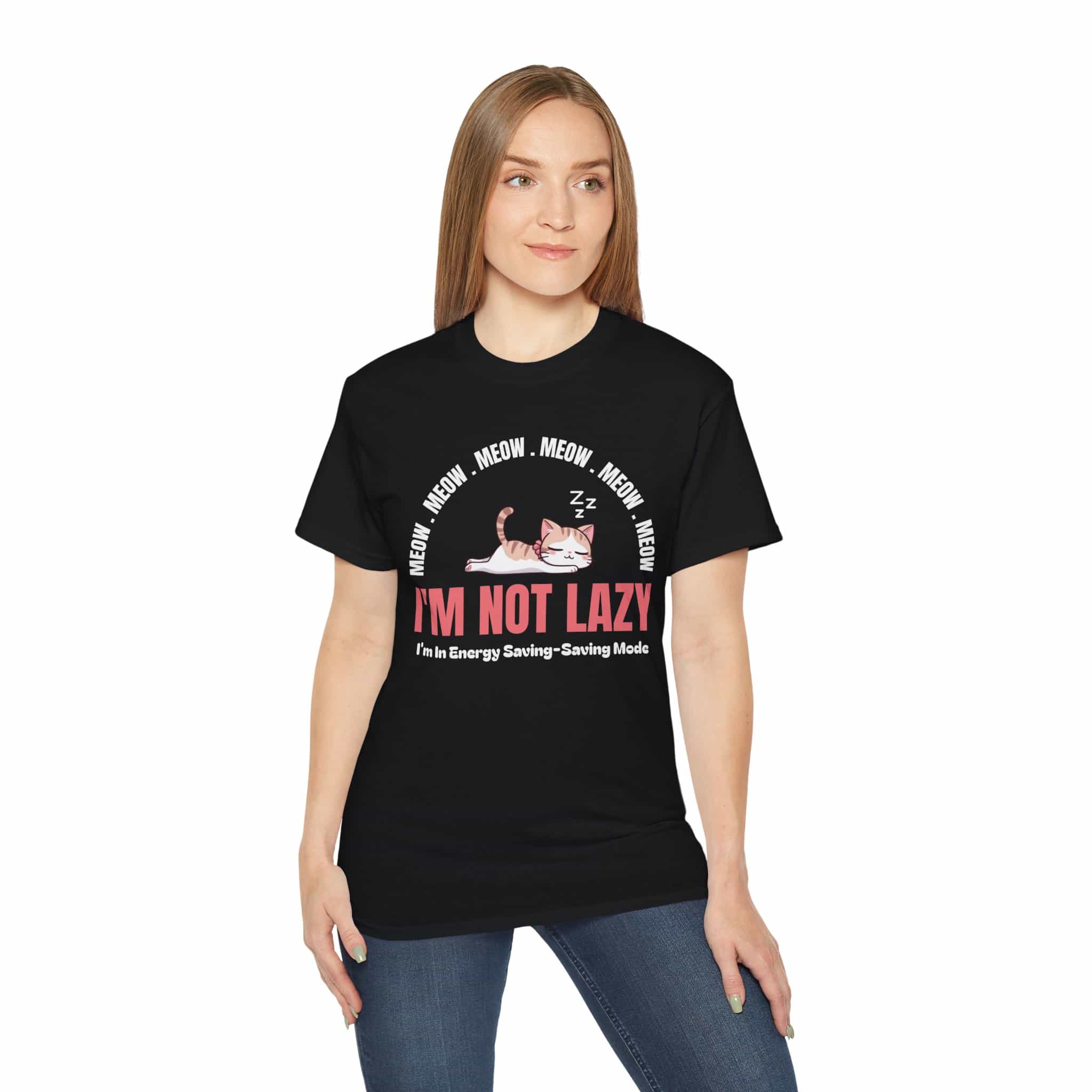 A woman in black Lazy Cat Funny T-Shirt featuring a sleeping cat with text I'm Not Lazy, perfect for cat lovers and humorous fashion.