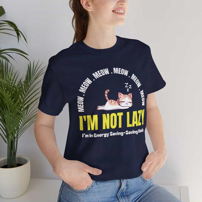 A woman wearing a navy blue Lazy Cat Funny T-Shirt featuring a sleeping cat with text I'm Not Lazy, perfect for cat lovers and humorous fashion.