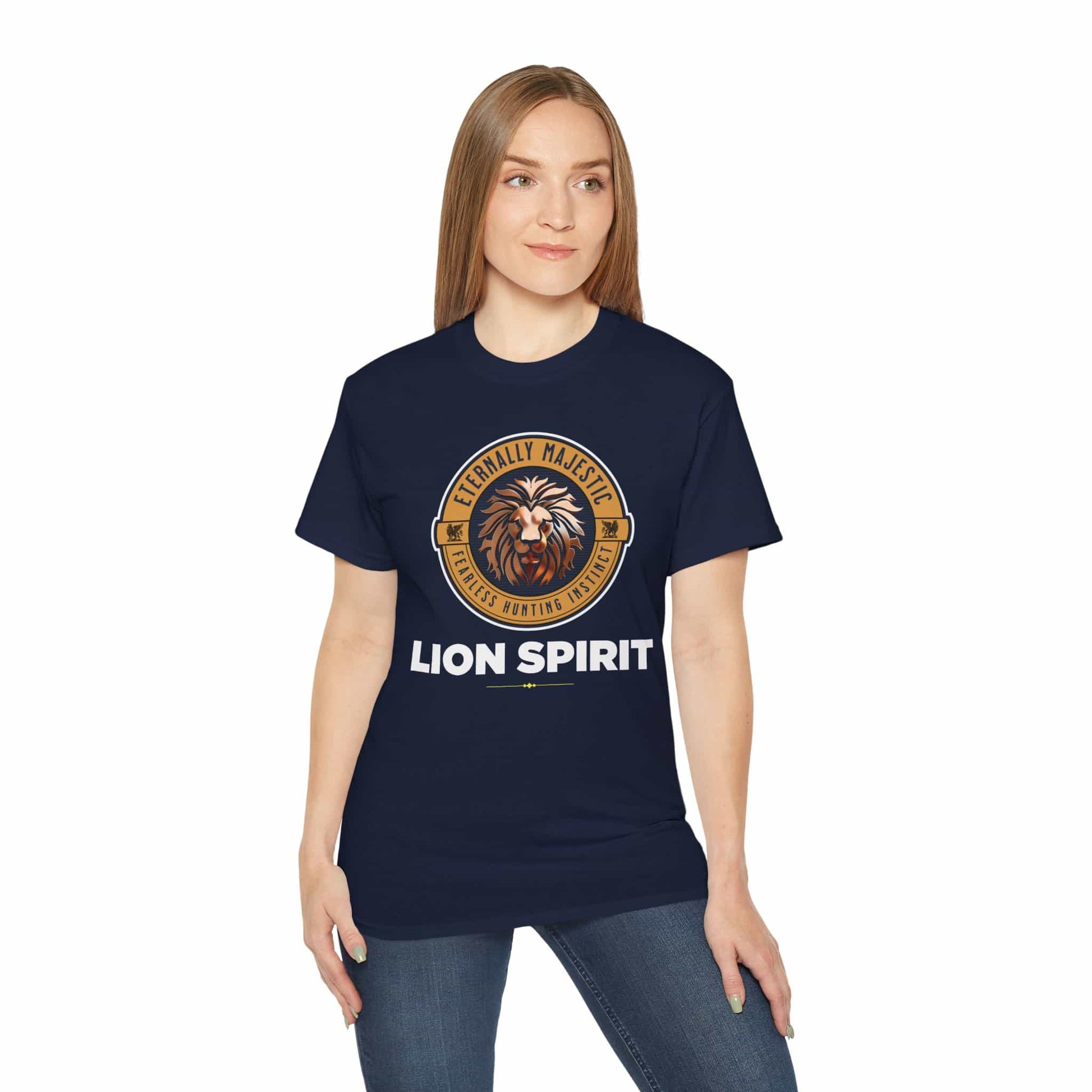 A woman wearing a navy blue Lion Spirit T-Shirt with a lion design and the text 'Eternally Majestic, Fearless Hunting Instinct'.