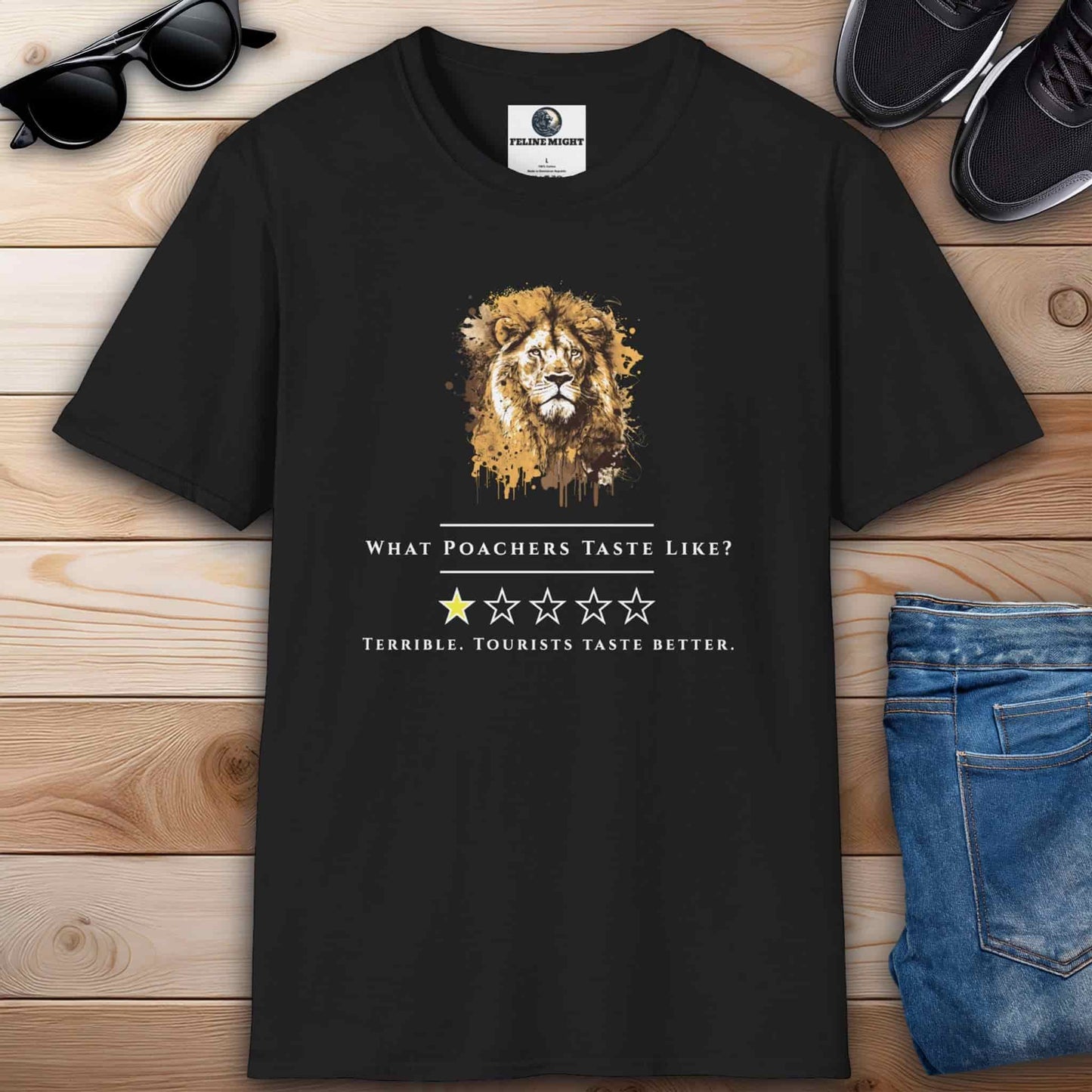 A black t-shirt showcasing a lion's head with a satirical quote about poachers and tourists.