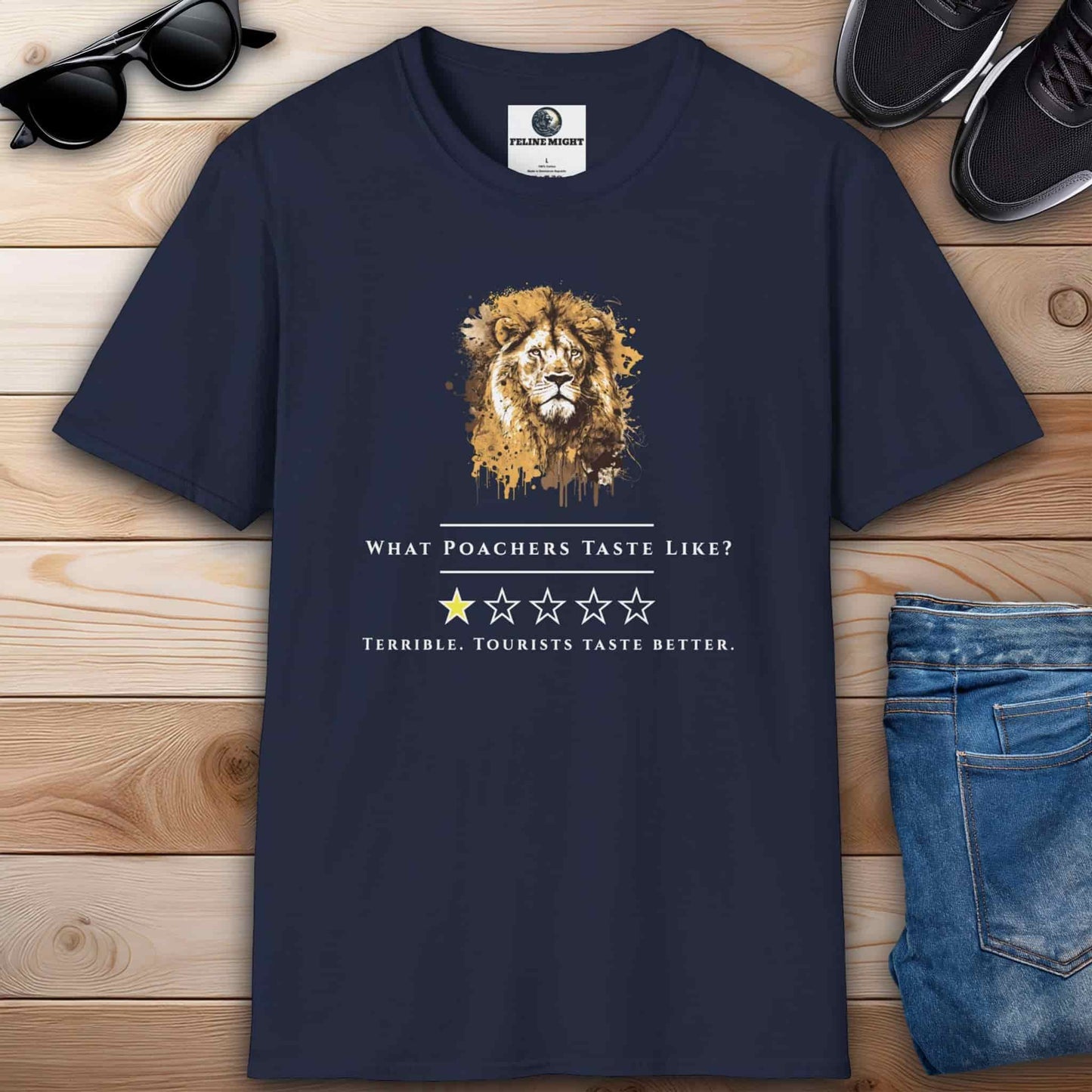 A navy blue t-shirt showcasing a lion's head with a satirical quote about poachers and tourists.