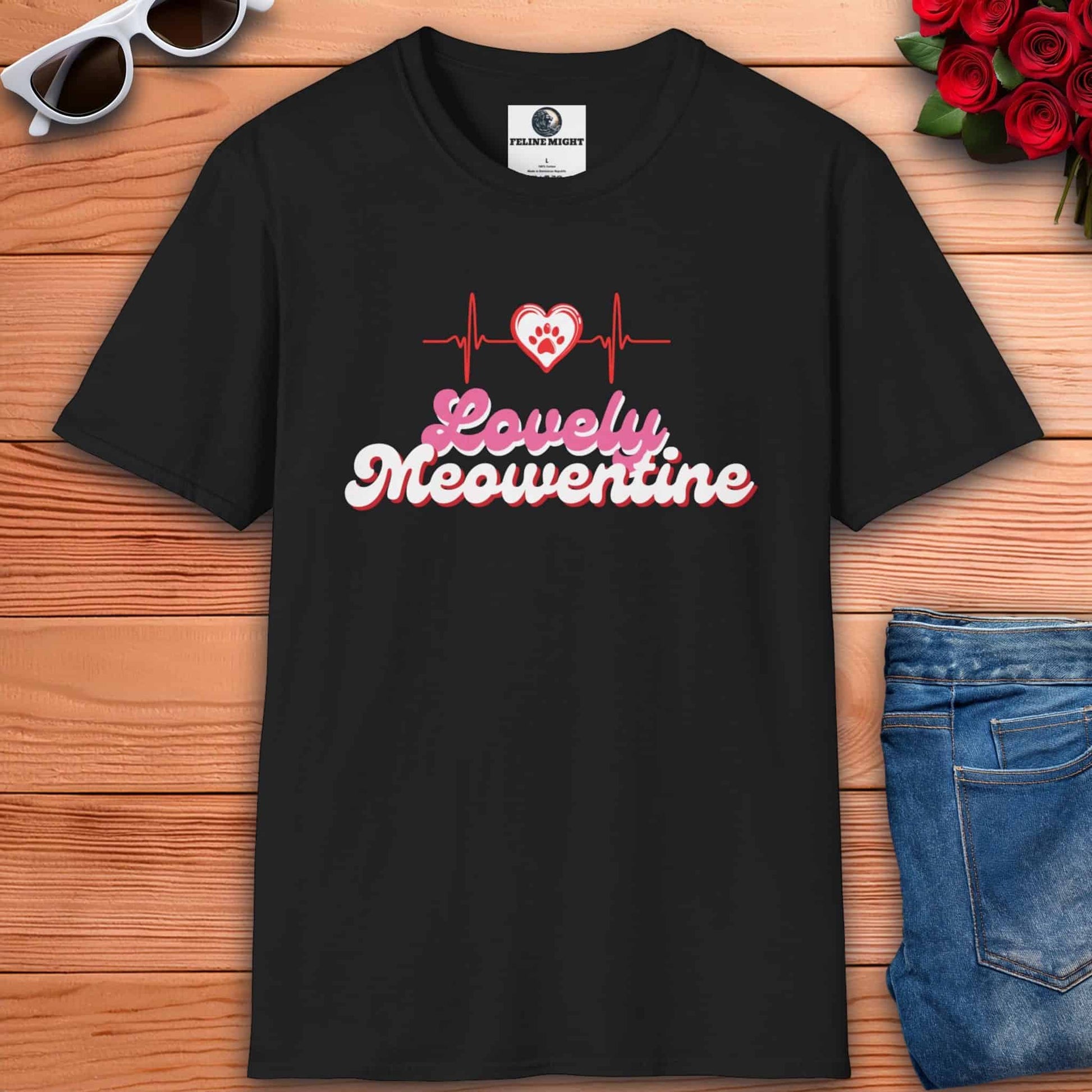 A black Lovely Meowentine Cat T-Shirt with a paw print and a heartbeat line, perfect for cat lovers celebrating Valentine's.