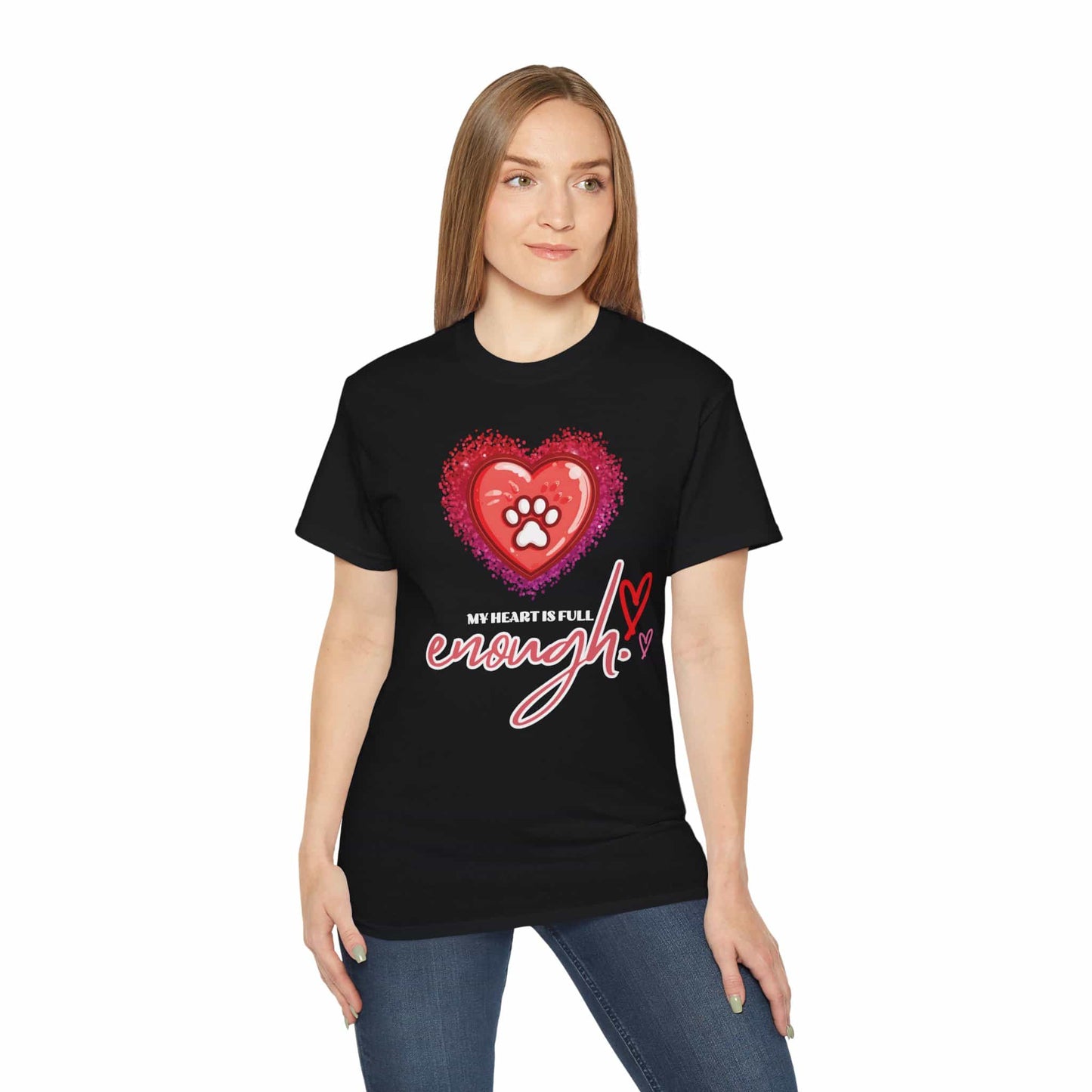 A woman wearing a black My Heart is Full Cat T-shirt with a heart and paw print design on a white background.