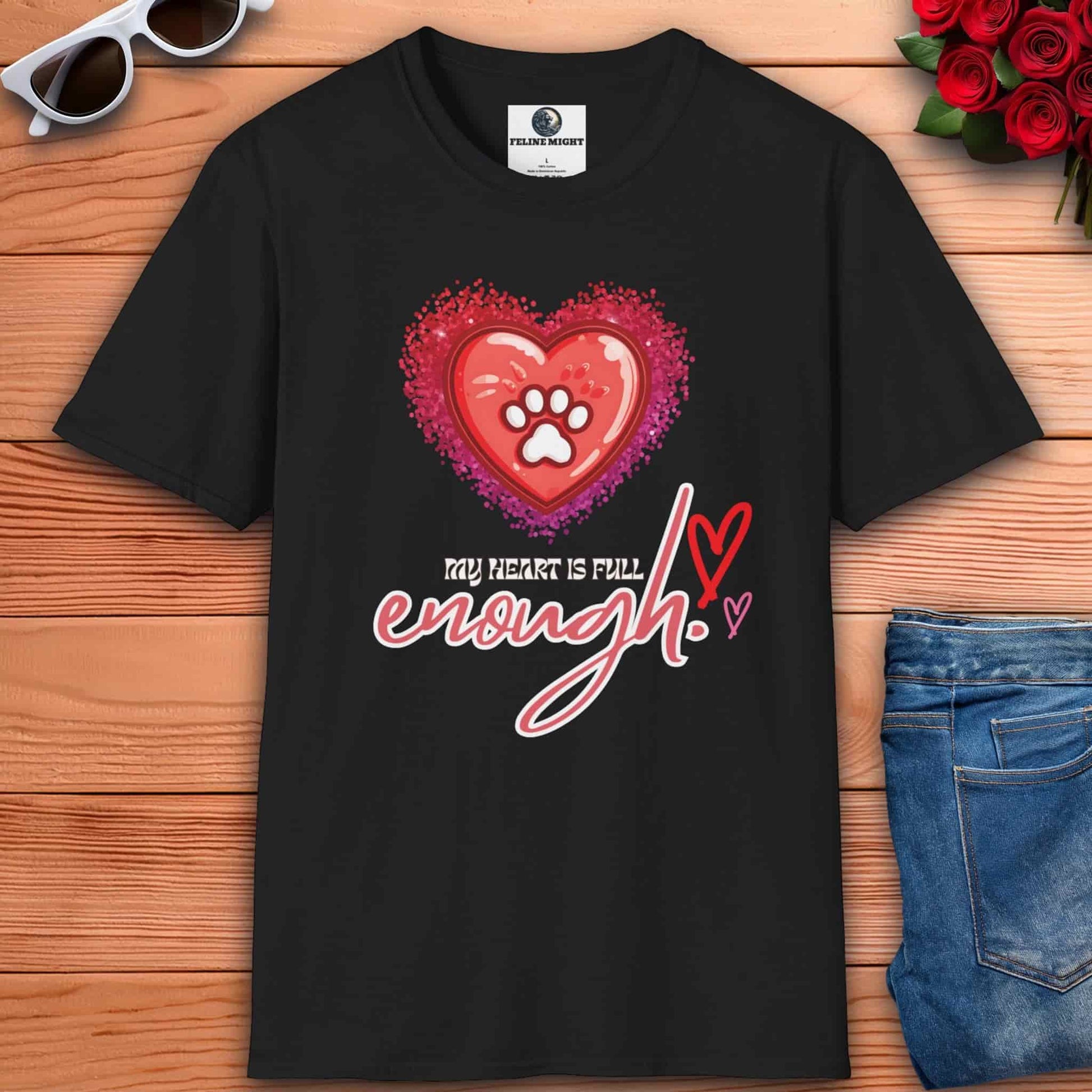 A charming black t-shirt with a heart and paw print that reads "My Heart is Full Enough," perfect for celebrating love and happiness.