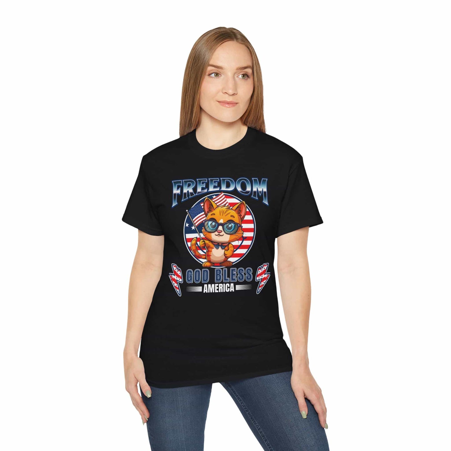 A black Patriotic Cat Freedom T-Shirt worn by a woman, featuring a cat graphic celebrating freedom and American pride, on a white background.