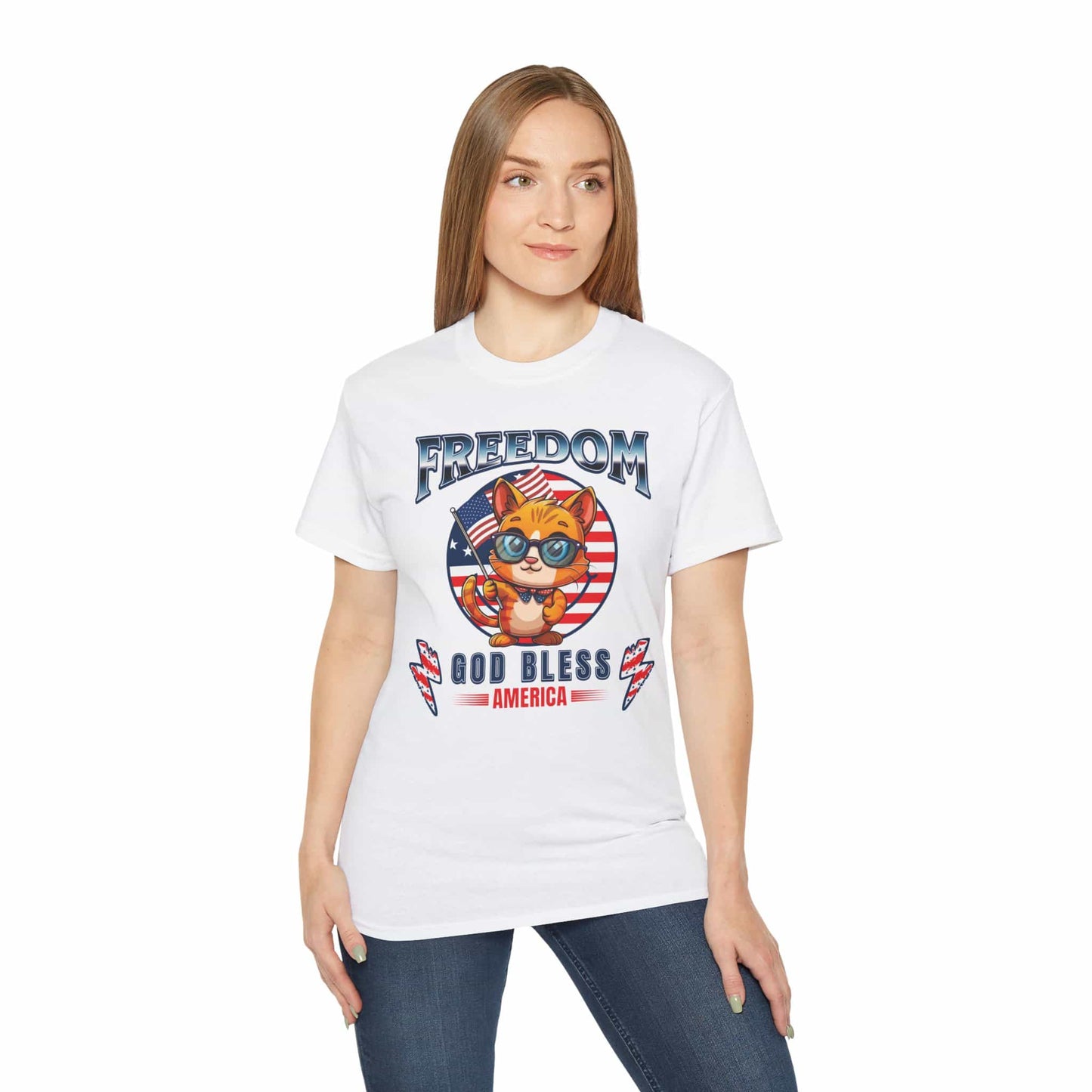 A white Patriotic Cat Freedom T-Shirt worn by a woman, featuring a cat graphic celebrating freedom and American pride, on a white background.