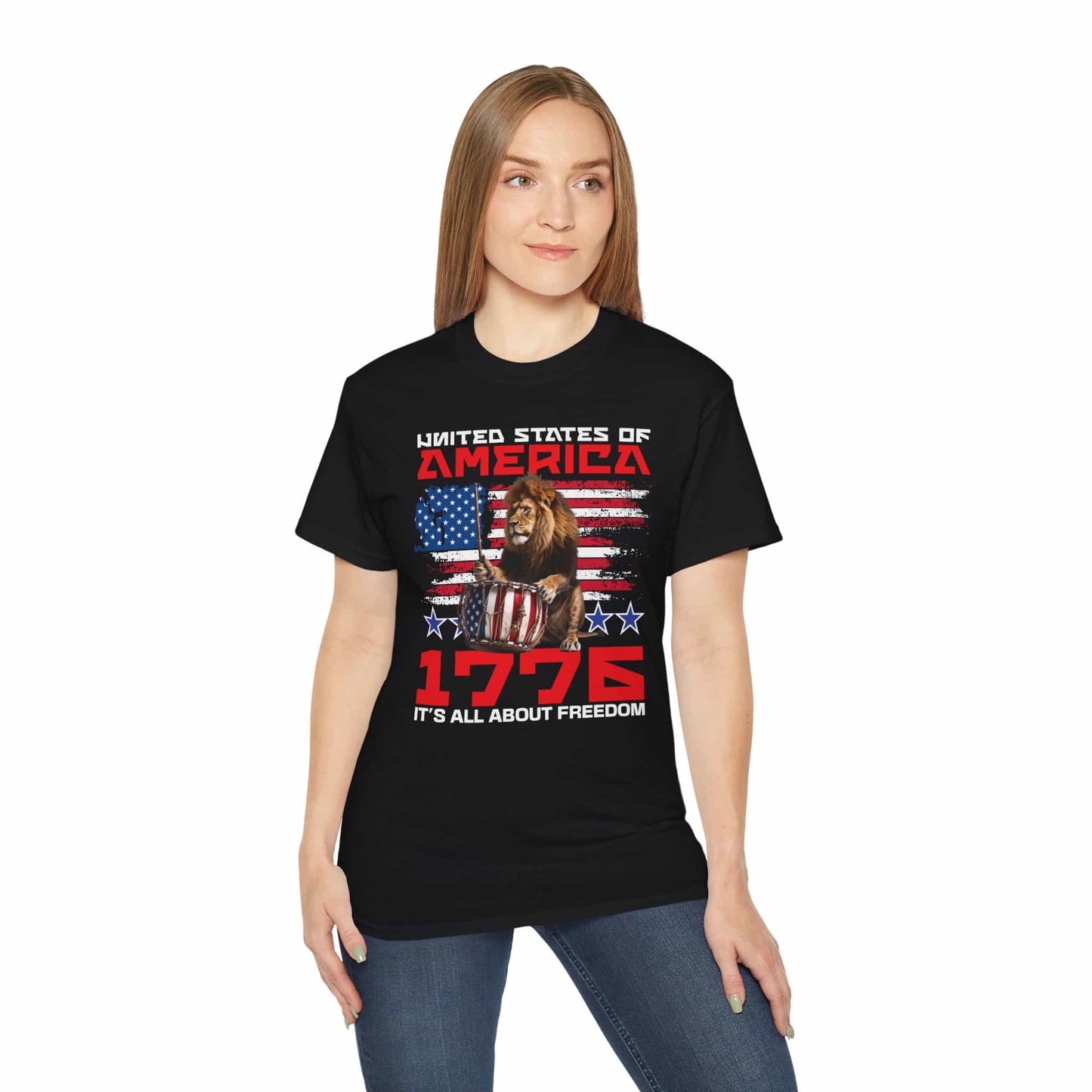 A woman wearing a black Patriotic Lion Freedom T-Shirt featuring a drum-playing lion and the American flag for national pride and freedom.
