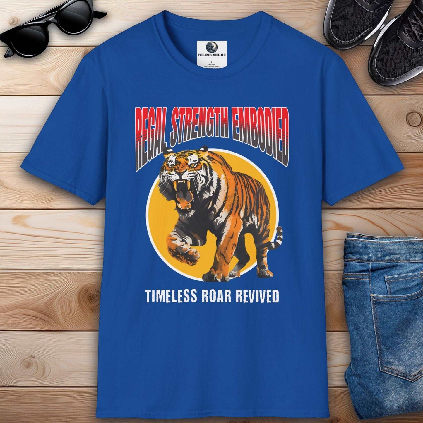 Eye-catching royal blue t-shirt featuring a roaring tiger graphic with the text 'Regal Strength Embodied' and 'Timeless Roar Revived'