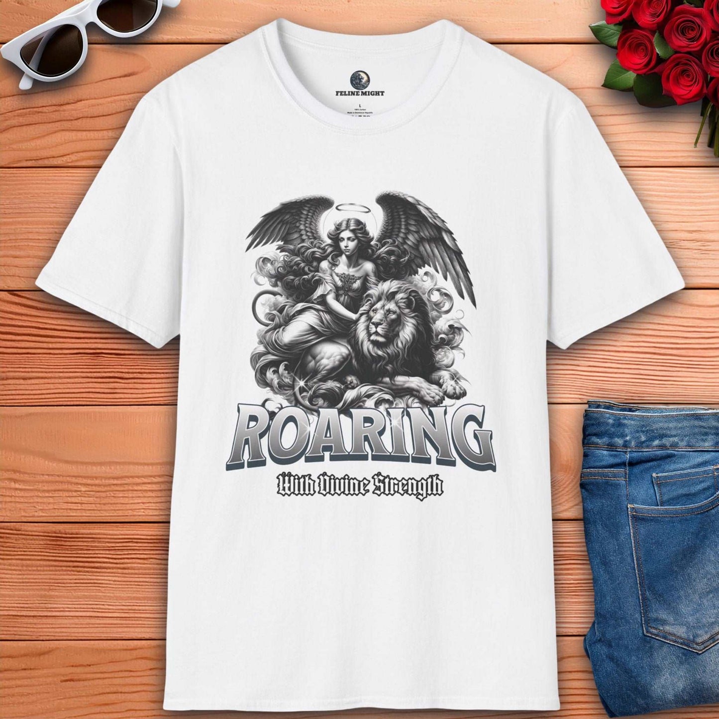 White t-shirt featuring a roaring lion and angel design with the text 'Roaring With Divine Strength'