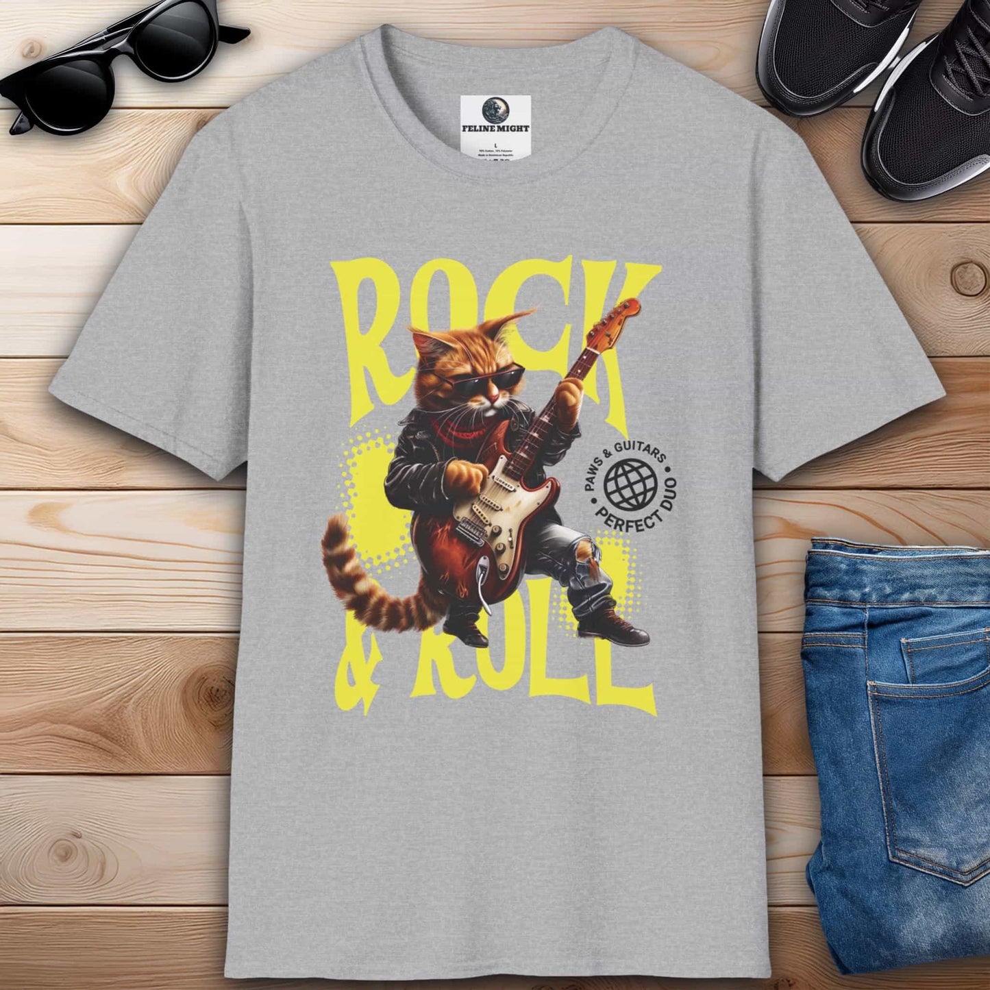 A cartoon cat dressed as a rockstar playing guitar on a stylish grey t-shirt