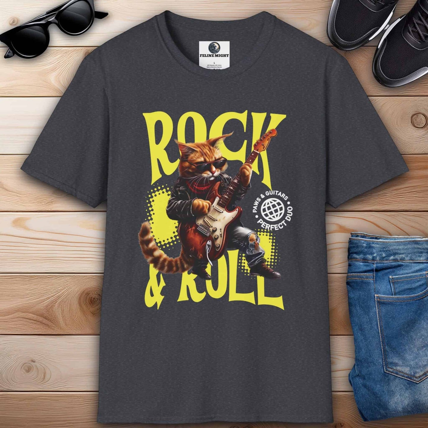 A cartoon cat dressed as a rockstar playing guitar on a stylish dark heather grey t-shirt