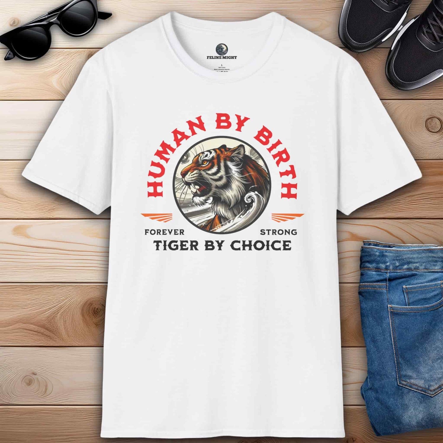 White t-shirt with 'Human by Birth, Tiger by Choice' graphic design featuring a majestic tiger.