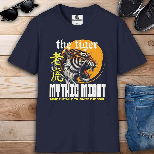 Navy blue t-shirt featuring a fierce tiger design with the text 'Mythic Might' and 'Tame the Wild to Ignite the Soul'.