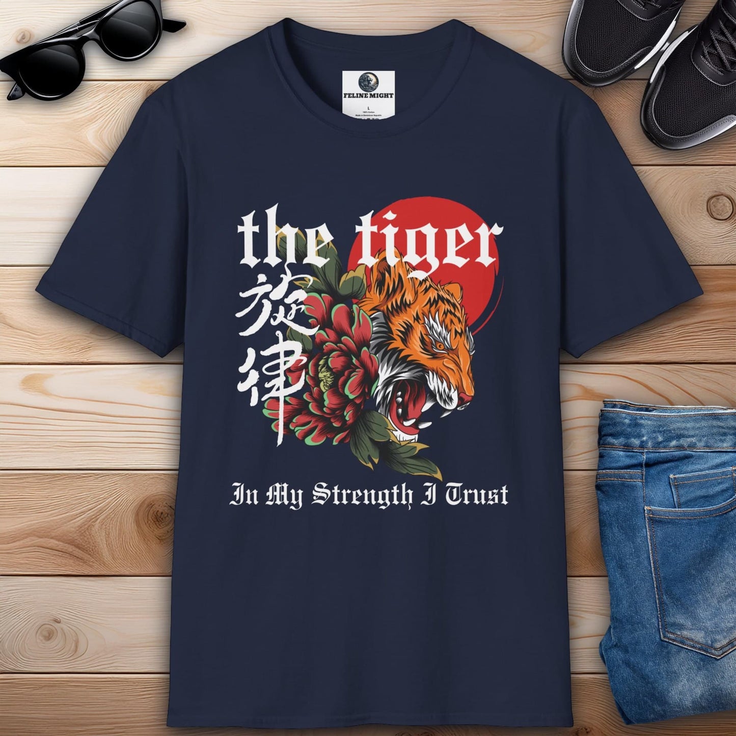 Navy blue t-shirt featuring a tiger design with floral elements and the phrase 'In My Strength I Trust'