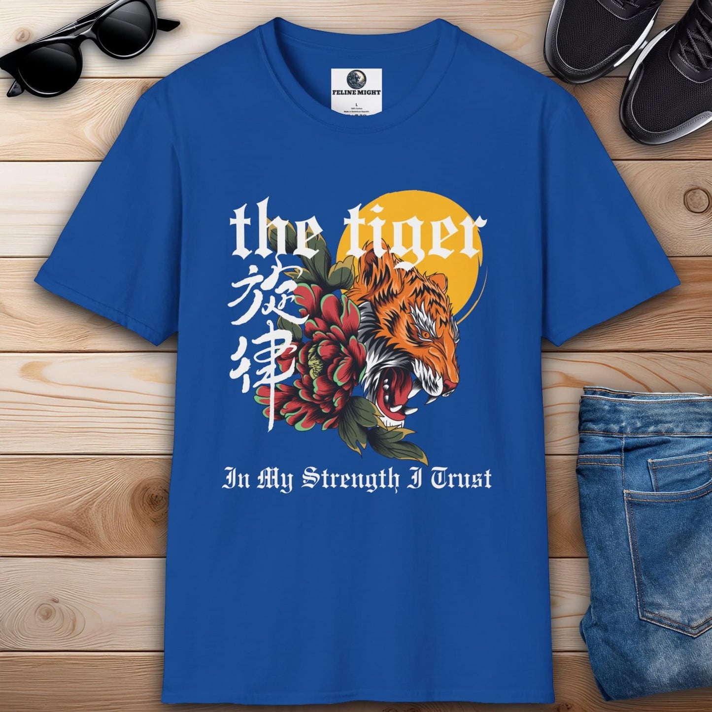 Royal blue t-shirt featuring a tiger design with floral elements and the phrase 'In My Strength I Trust'