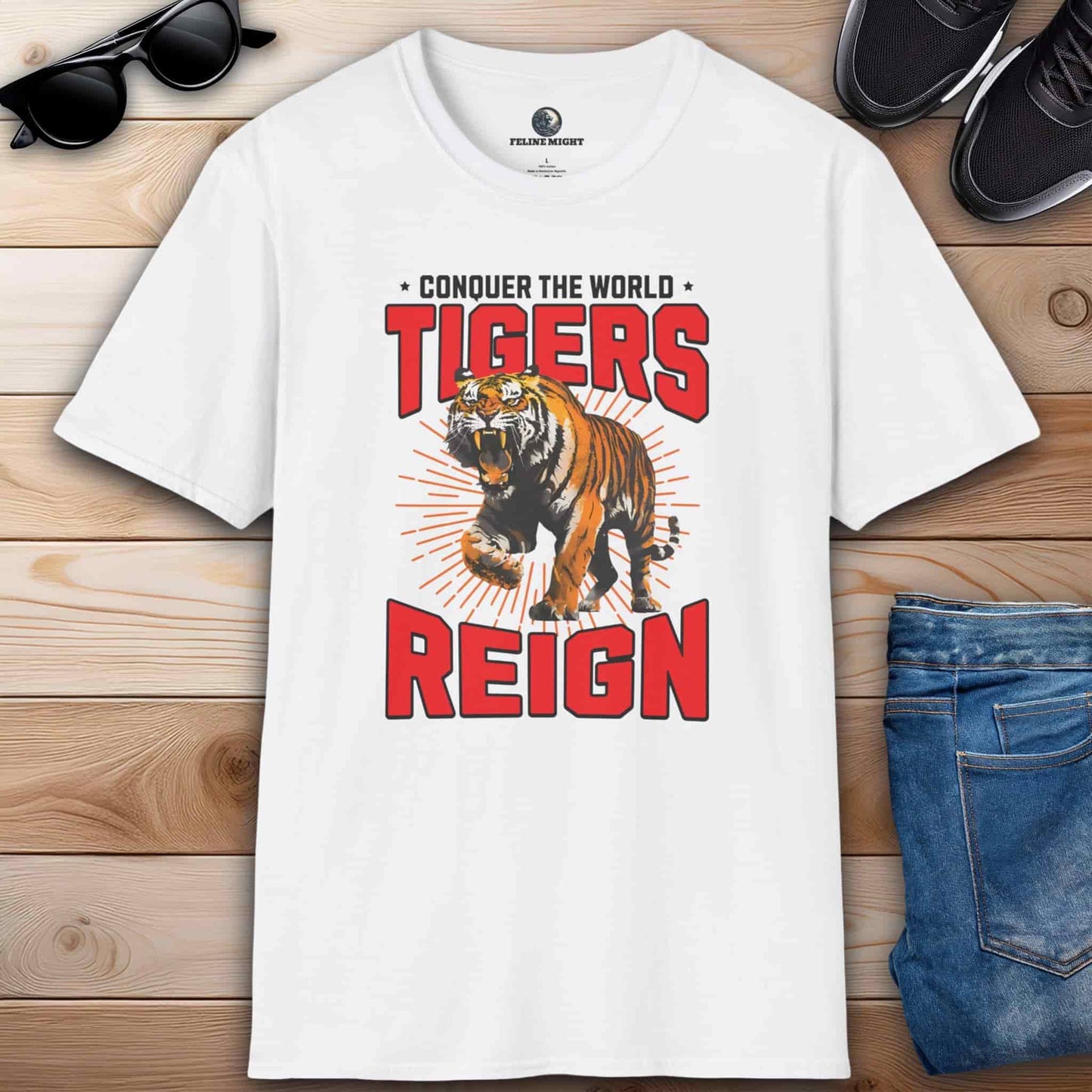 White t-shirt with a tiger graphic and the text 'Tigers Reign - Conquer the World'