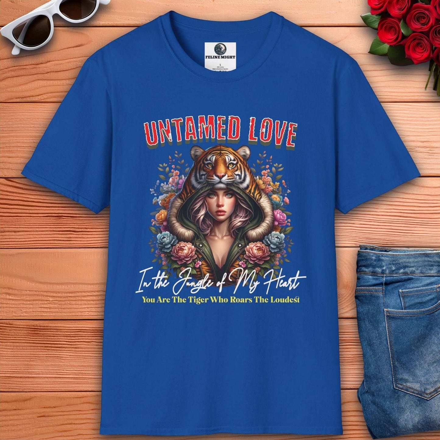 Royal blue t-shirt featuring a woman in a tiger hood with floral designs and the text 'Untamed Love'