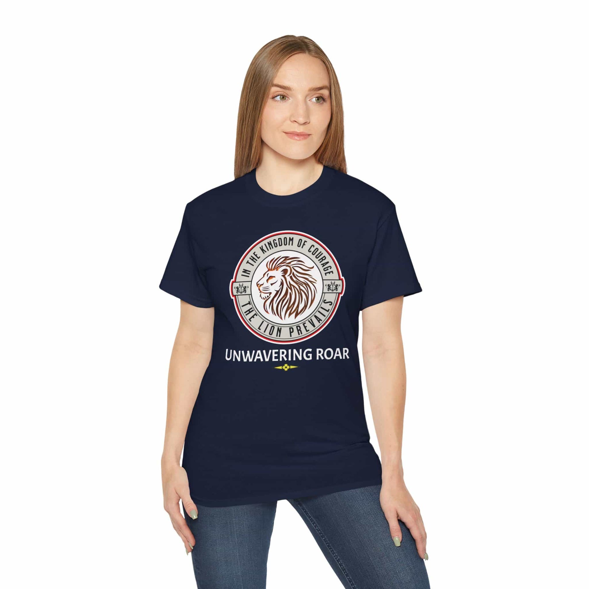 A woman wearing a Unwavering Roar Lion T-Shirt featuring a lion graphic and bold text design on a navy blue unisex premium tee.