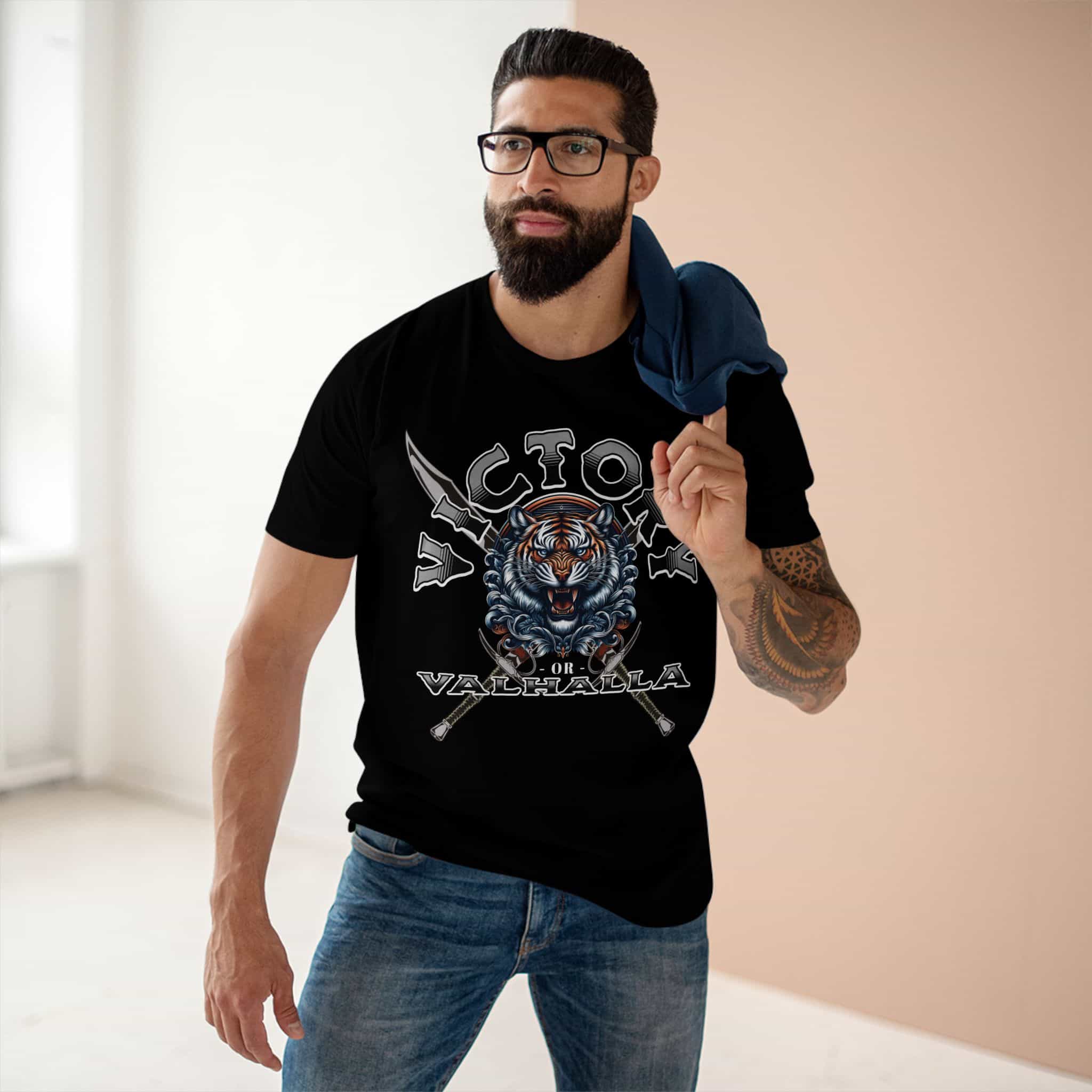 A man wearing a black Viking Tiger T-Shirt featuring bold design with tiger and crossed swords.