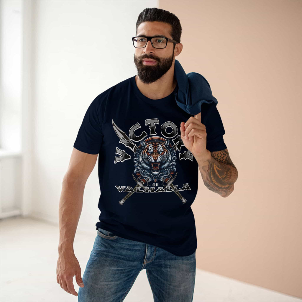 A man wearing a navy blue Viking Tiger T-Shirt featuring bold design with tiger and crossed swords.