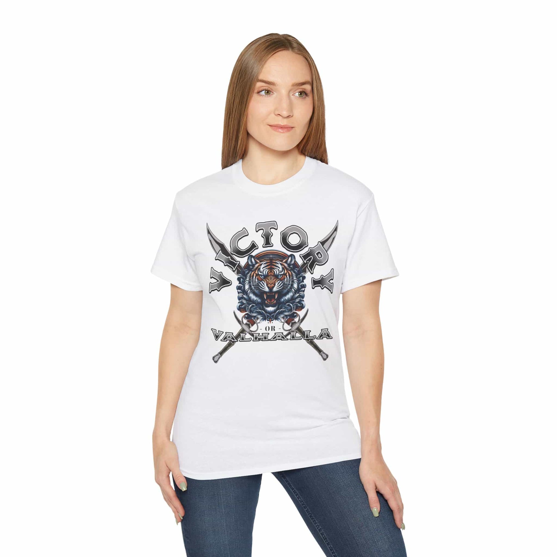 A woman wearing a white Victory or Valhalla Tiger T-Shirt featuring bold design with tiger and crossed swords.