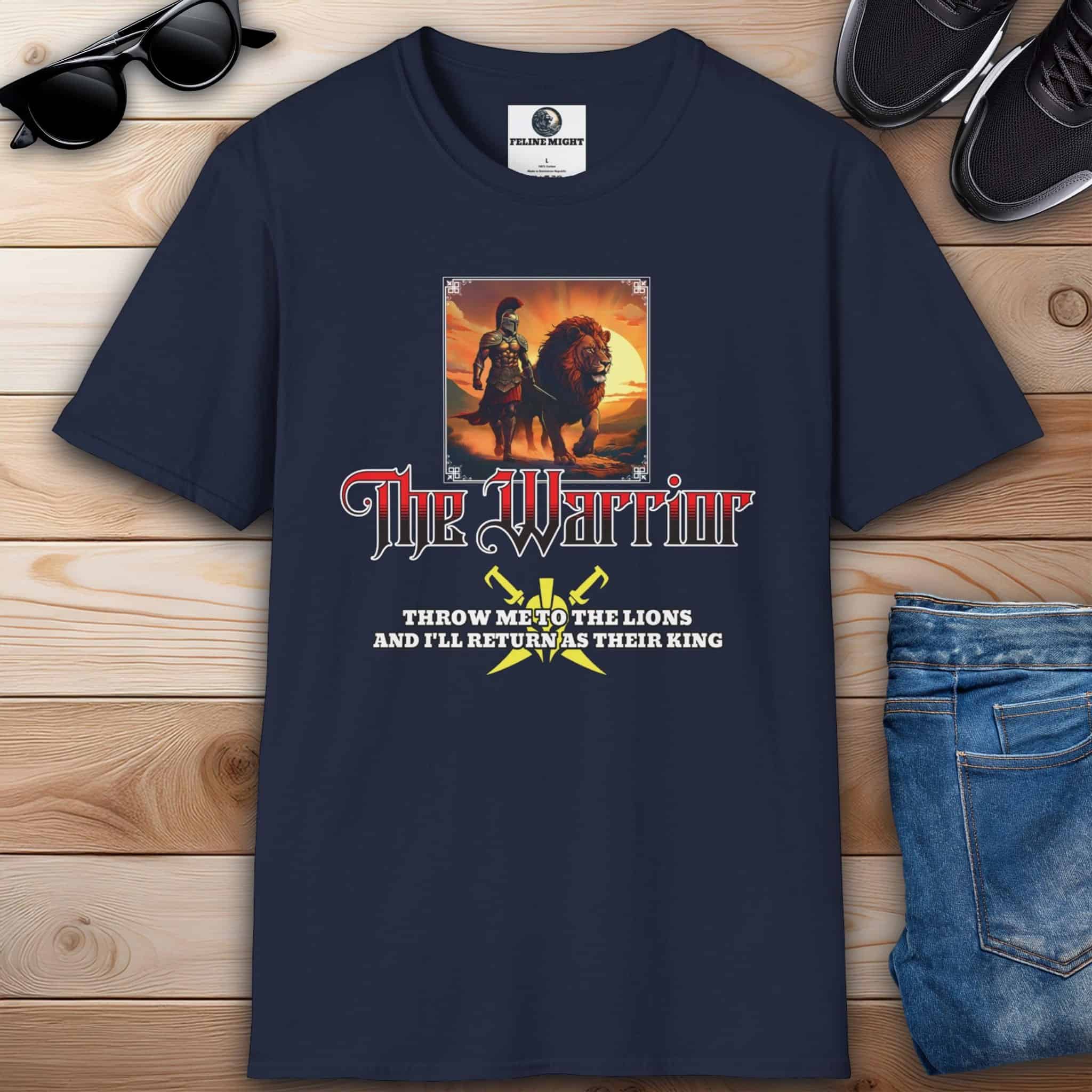 A navy blue The Warrior King Lion T-Shirt depicting a warrior with a lion and the phrase 'Throw me to the lions and I’ll return as their king'.