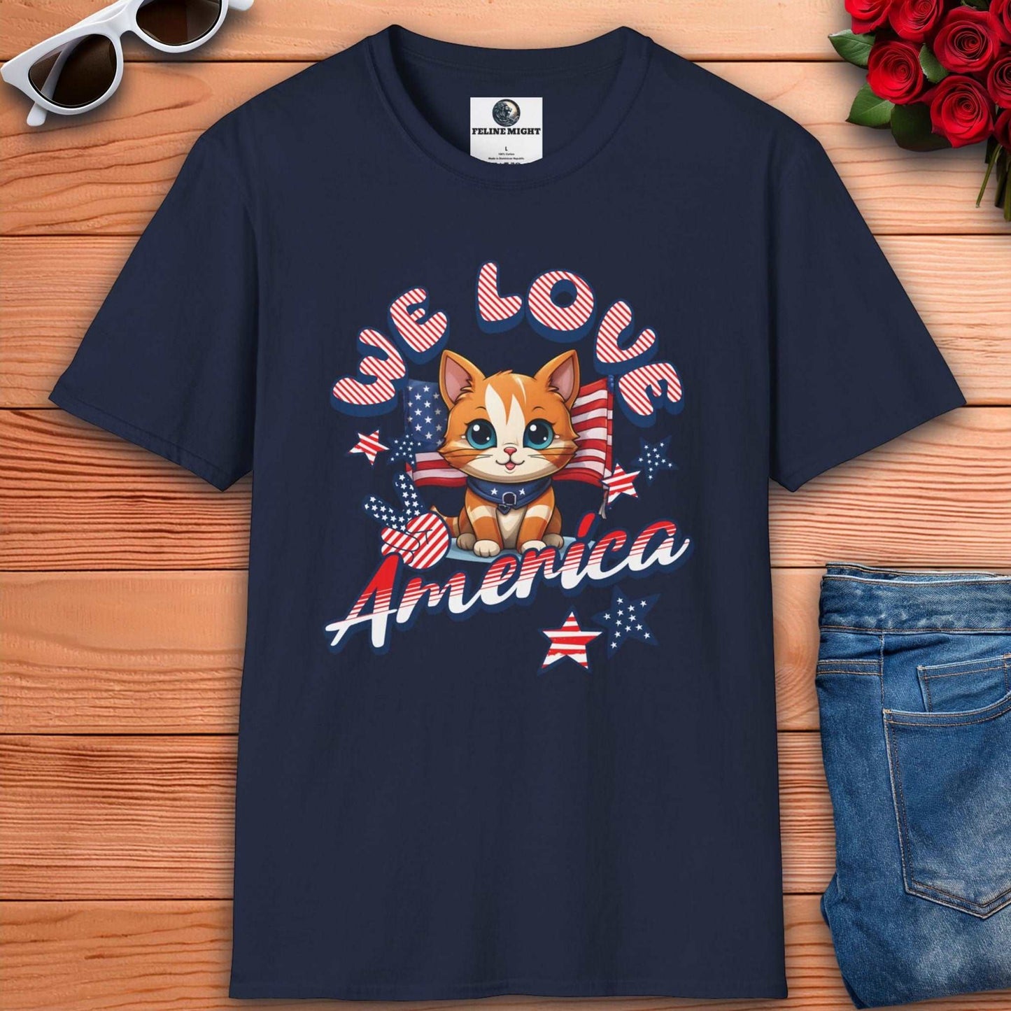 Navy blue t-shirt featuring cute cat design with 'We Love America' text and patriotic elements