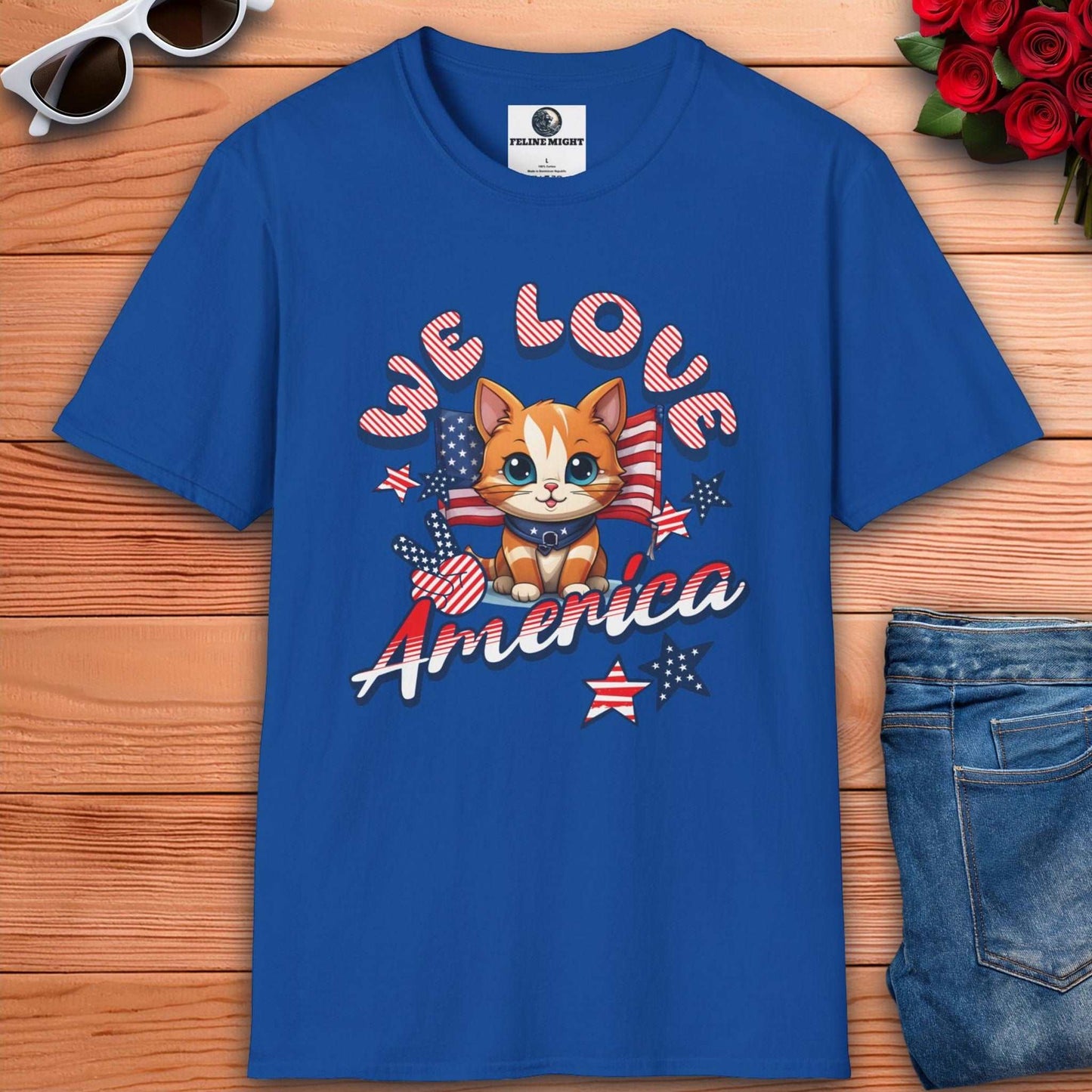 Royal blue t-shirt featuring cute cat design with 'We Love America' text and patriotic elements