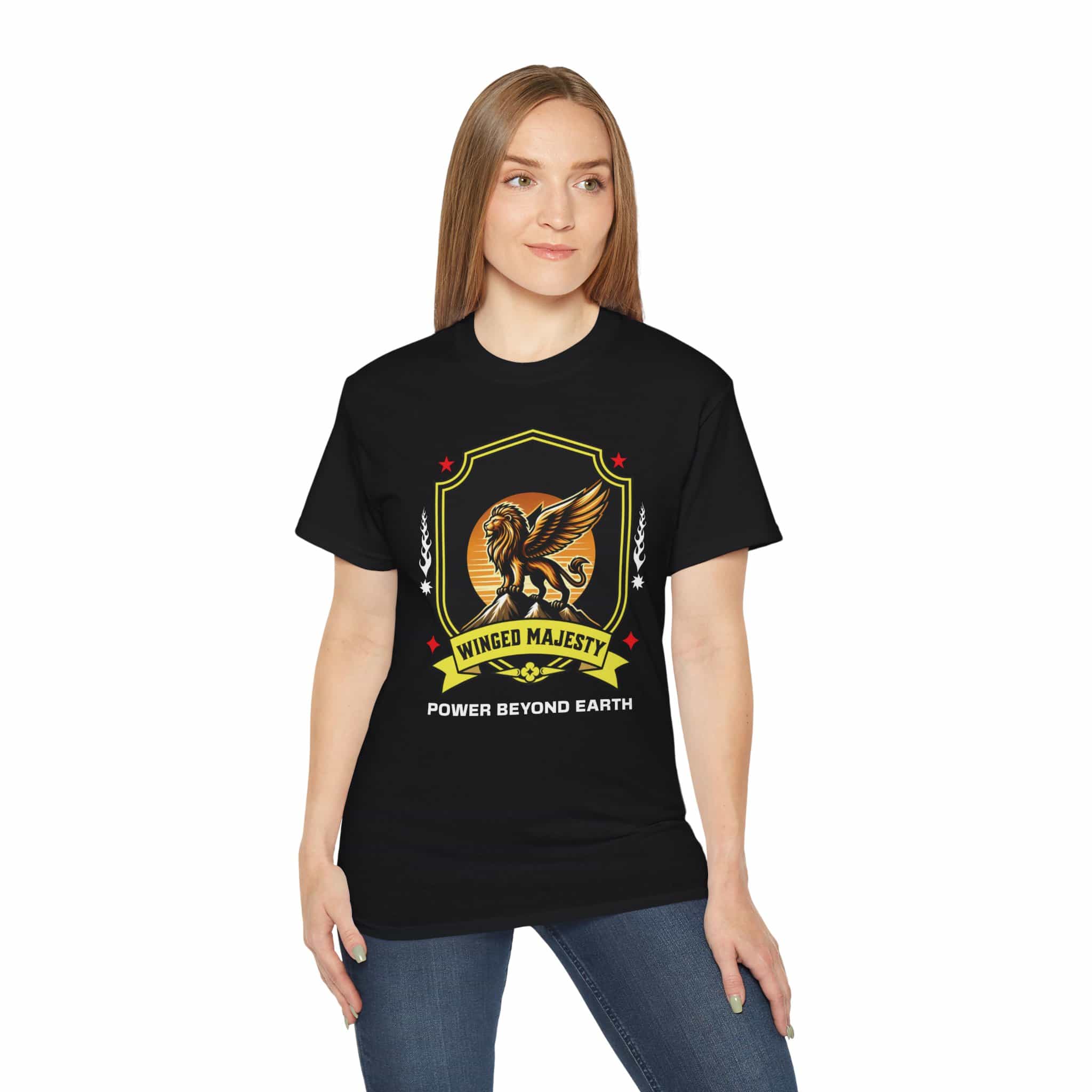A woman wearing a black Winged Majesty Lion T-Shirt featuring a golden-winged lion graphic and the text 'Power Beyond Earth'.