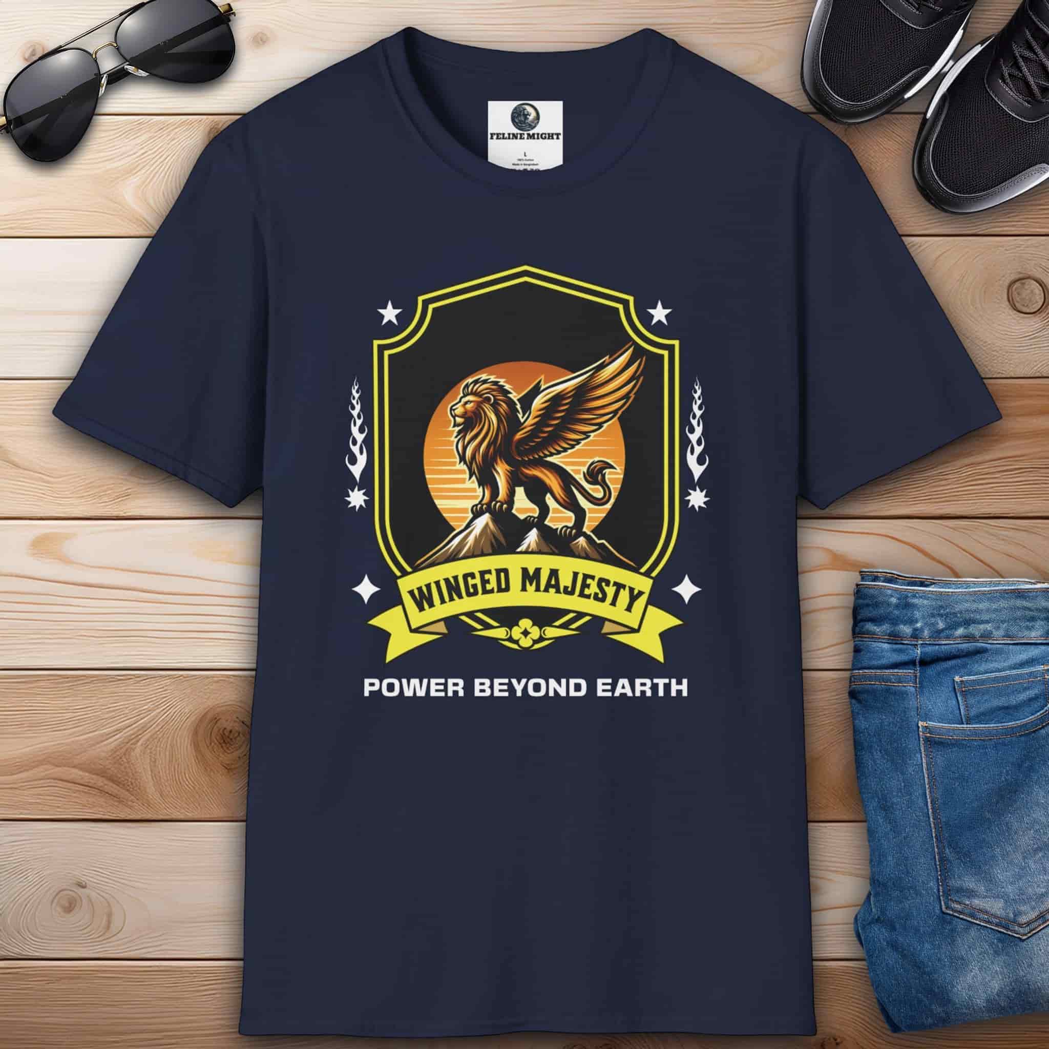 A navy blue Winged Majesty Lion T-Shirt featuring a golden-winged lion graphic and the text 'Power Beyond Earth'.